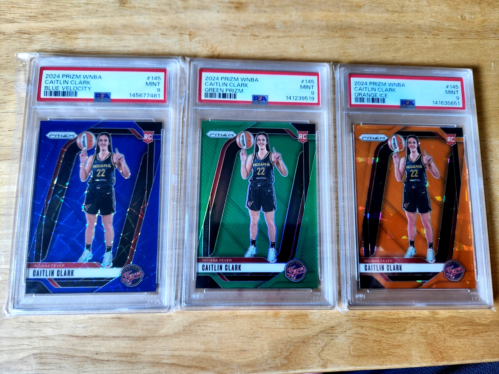 CAITLIN CLARK PRIZM RC LOT BLUE VELOCITY ORANGE ICE GREEN FEVER PSA 9 #145 view 1