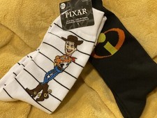 Pixar Woody Buzz Lightyear And The Incredibles Logo Men s Sz 6-12 Socks