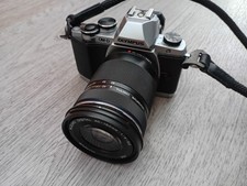 Olympus OMD E-M10 Mark I and 40 -150 f4-5.6 lens. low Shutter Count: 4,900
