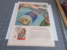 1957 Car Auto Oil Filter AC 50s Vintage Print Ad Bargeload River Bridge Dogs