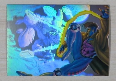 1995 FLAIR MARVEL ANNUAL HOLOBLAST - GAMBIT VS SABRETOOTH #12 - LIMITED HOLOGRAM