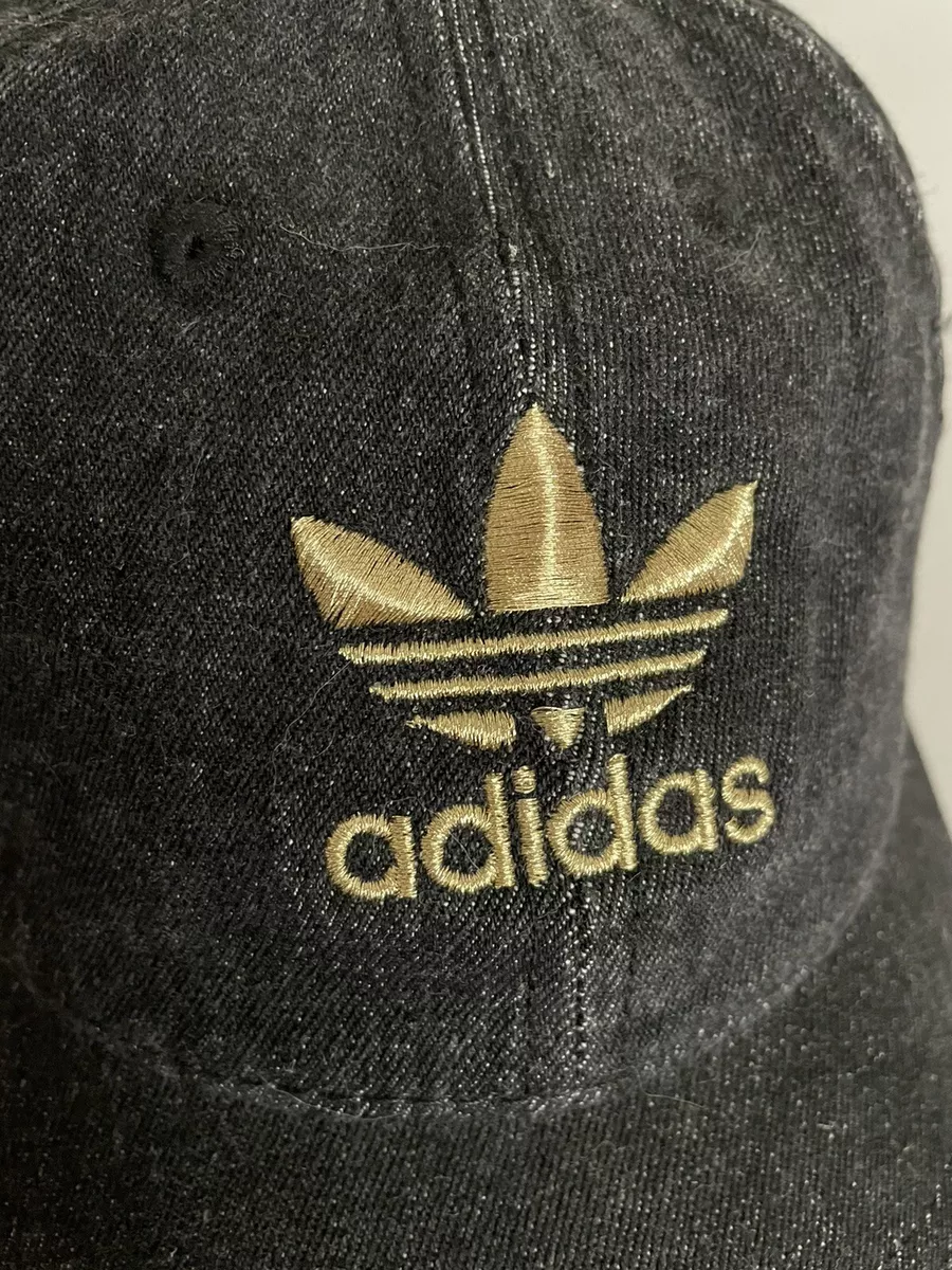 Black adidas hat with top gold logo