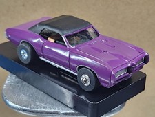 PONTIAC GTO CONVERTABLE ON AUTO WORLD CHASSIS HO SLOT CAR
