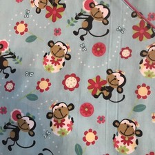 Beverly Hills Woman's Scrub Top Size Medium. Light Blue w/Monkey's and Pink Trim