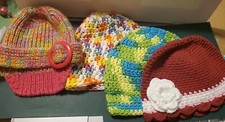 little girls knitted hats x 4 , 2 new 2 pre owned