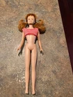 Vintage 1964 Mattel Redhead Skooter Doll with top of original swimsuit