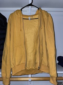 yellow zip up