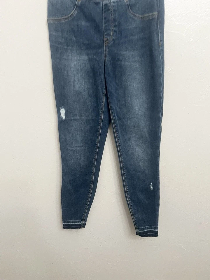 Pantalones de mezclilla ajustados Spanx desgastados al tobillo dobladillo crudo lavado pequeño desgastado Foto 2 de 4