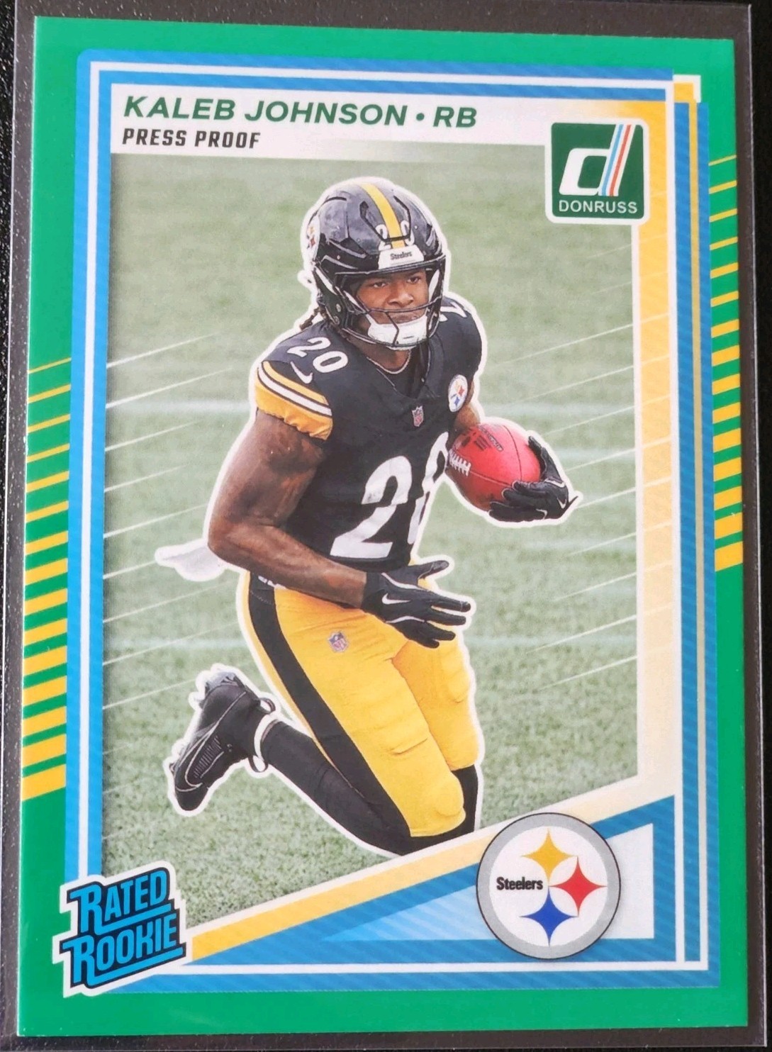 2025 Panini NFL Donruss #322 Kaleb Johnson RC Rated Rookie Green Press Proof