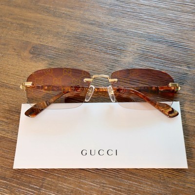 Gucci GG1221S 004 56mm Rectangle Sunglasses in Gold/Brown GG Logo Lens