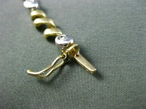 ESTATE .42CT DIAMOND 14KT WHITE & YELLOW GOLD ETOILE MULTI WAVE TENNIS BRACELET - Picture 7 of 12
