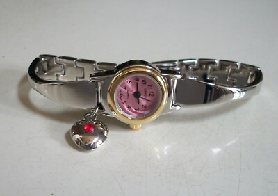 Women's Silver Or Gold Finish Dangling Heart Color Dial Fashion Fun Watch