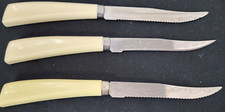 Vintage Quikut Steak Knife Stainless USA Cream Handles MCM 2 Serrated 1 Smooth