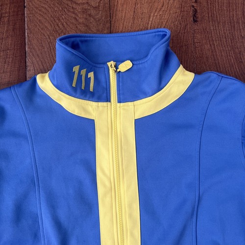 Bethesda Fallout 4 Vault 111 Track Jacket Zip Blu Giallo Uomo Medium Ufficiale - Foto 2 di 10