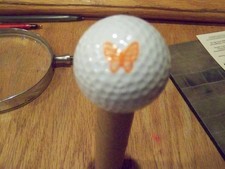 ORANGE BUTTERFLY LOGO GOLF BALL NEW