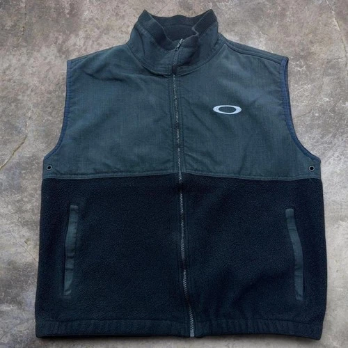 Oakley black & gray fleece vest with zipper pockets Oakley software vest - product listing photo