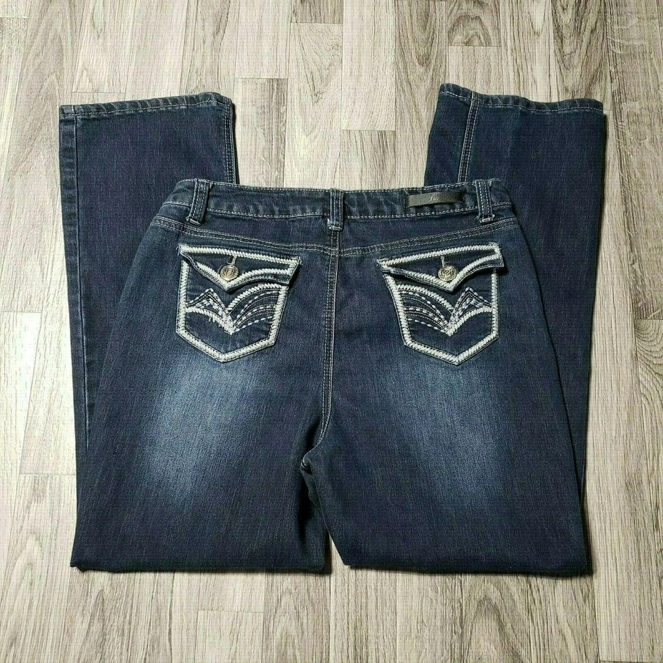 Pantalones de mezclilla azul con bolsillos traseros bordados pequeños Baccini para mujer talla 10 Foto 2 de 4