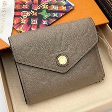 Louis Vuitton Monogram Empreinte Portefeuille Zoe Tri Fold Wallet