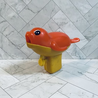 Vintage 1970s Yellow And Orange Hand Held Seal Squirt Gun Toy