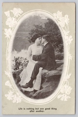 Couple Kissing ''Life is Nothing But One Good Thing After Another.''  Bamforth 