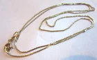 14kt gold serpentine link chain 19" long, (.75 mm), 1.5 grams