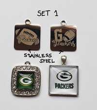 Sale set 4 pcs stainless steel, CZ stones charms of Green Bay Packers Football.