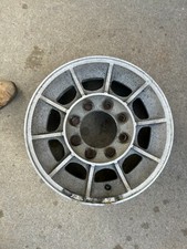 UNKNOWN 16.5 ALUMINUM WHEEL RIM 8 BOLT.   MAYBE VINTAGE DODGE MOTOR HOME ?