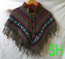 Vintage 1970s Child Poncho Boho Knit Fringe Pom Pons Crochet Gray Blue White Red
