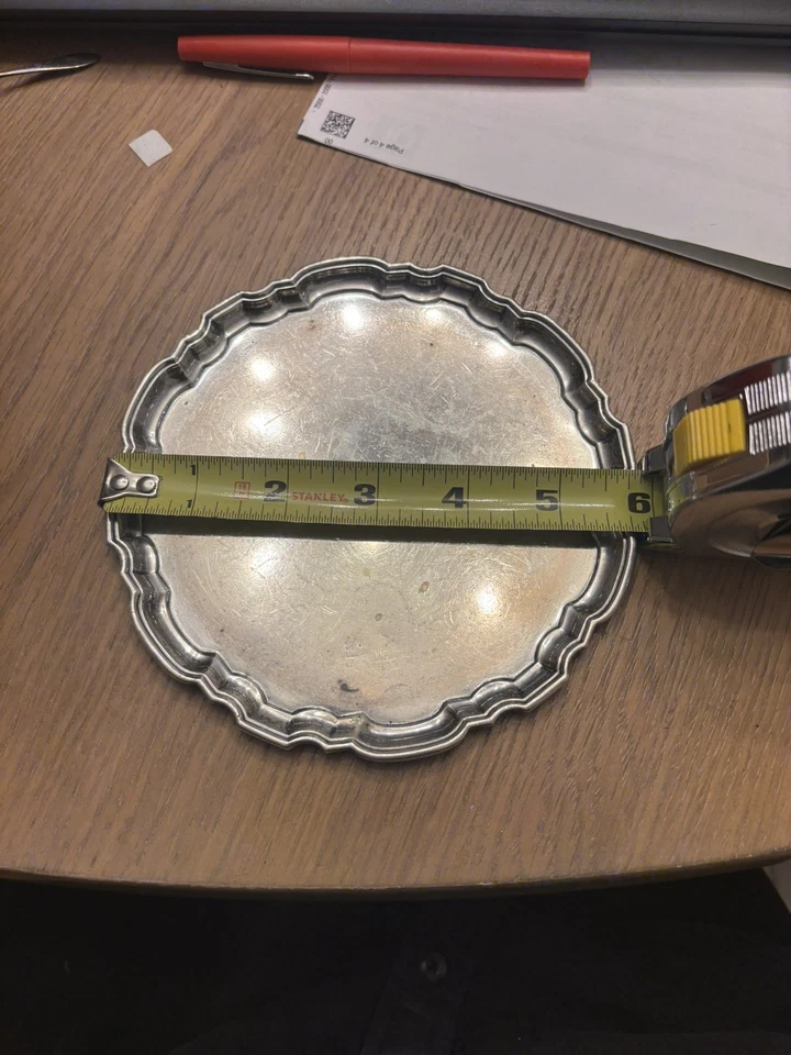 Placa de plata de ley Tiffany & Co  Foto 3 de 4