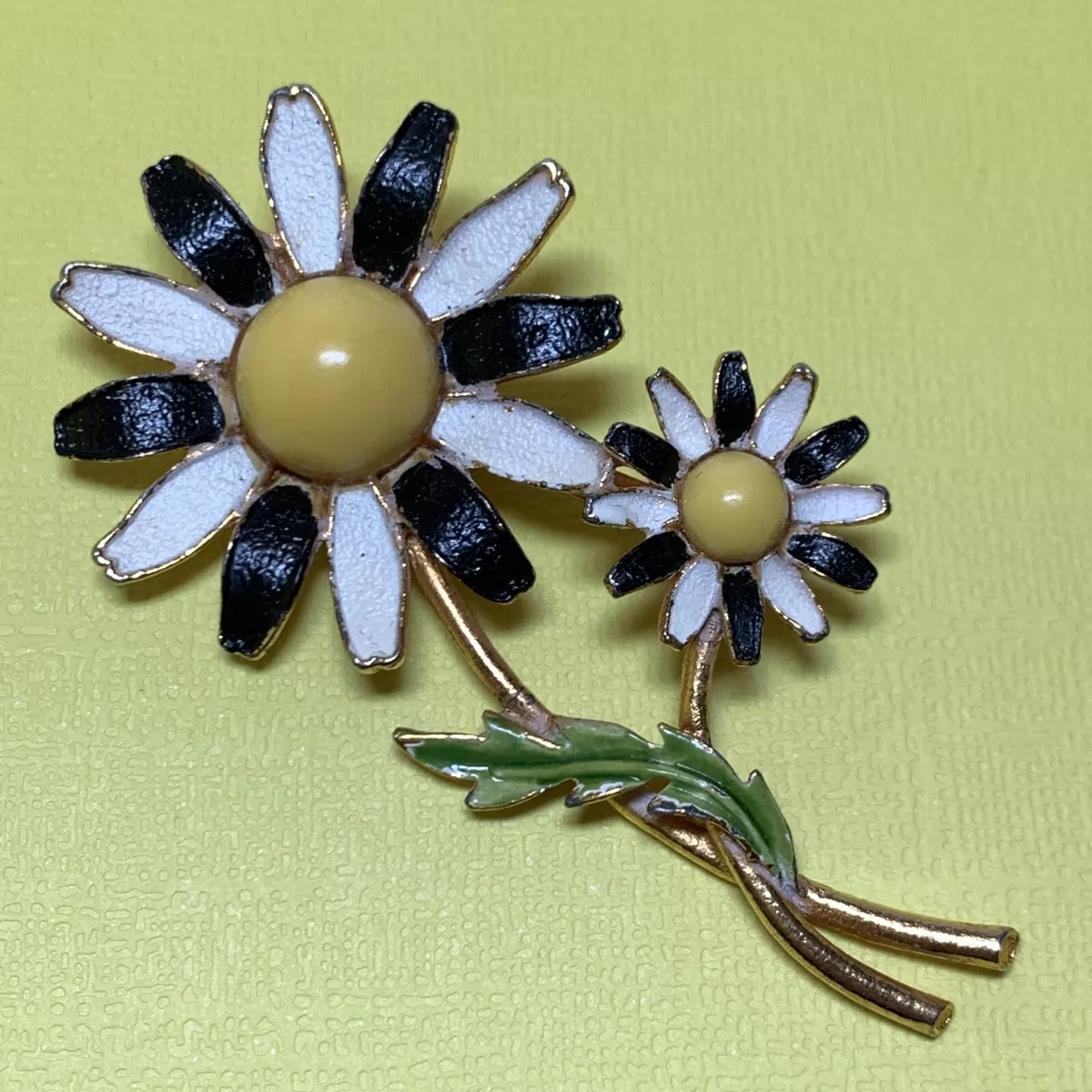 Double brooch deals