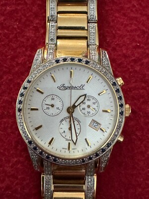 INGERSOLL DIAMOND  AND JEMS IG 0214 DG N 01555 18 CARAT GOLD PLATED USED