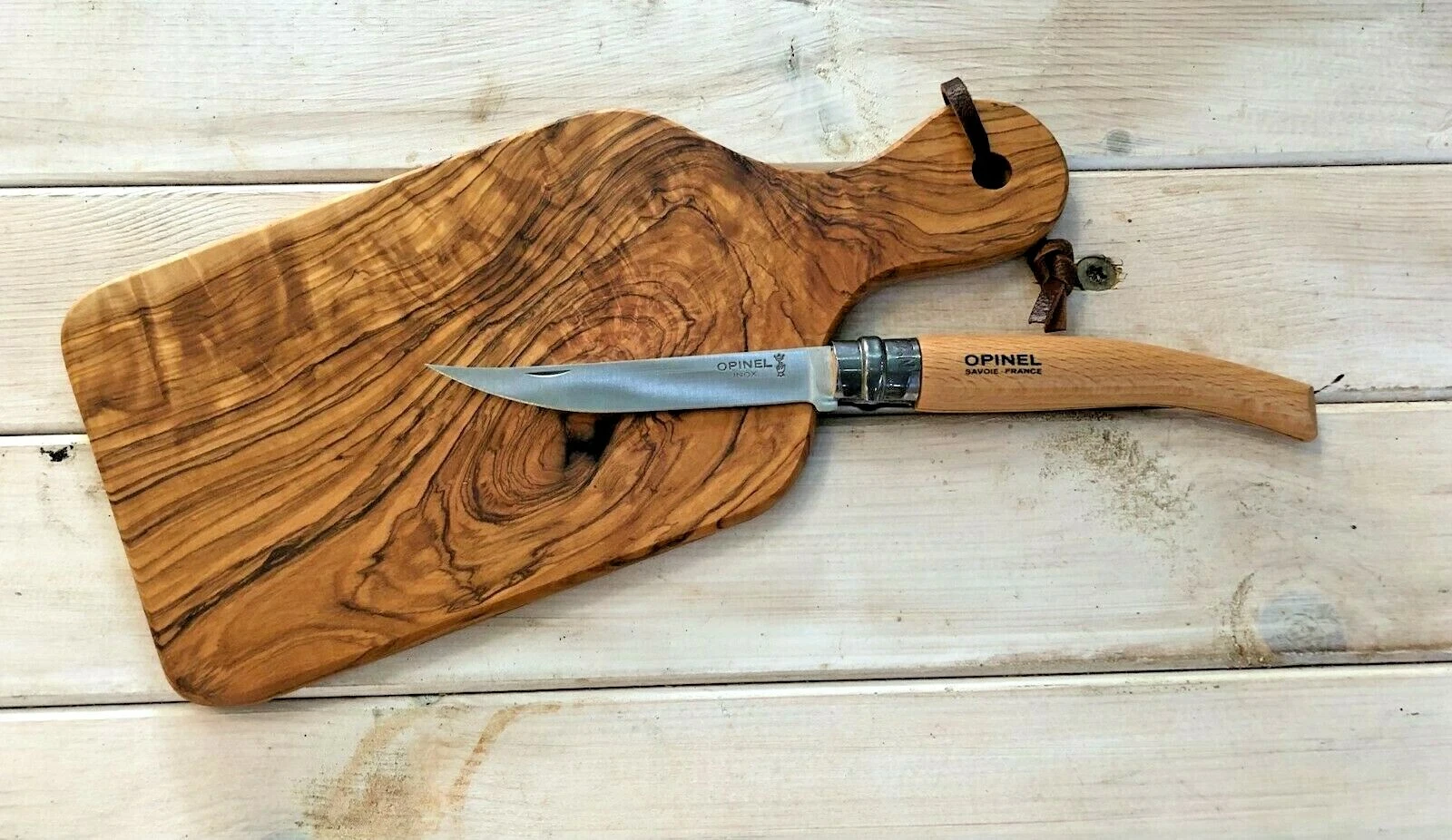 Olive wood serving board made in Bethlehem, Israel & Opinel Slimline