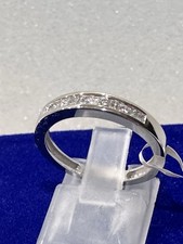 14KT White Gold wedding band with 0.30ct. princess cut Diamond size 6.5, 2.8gram