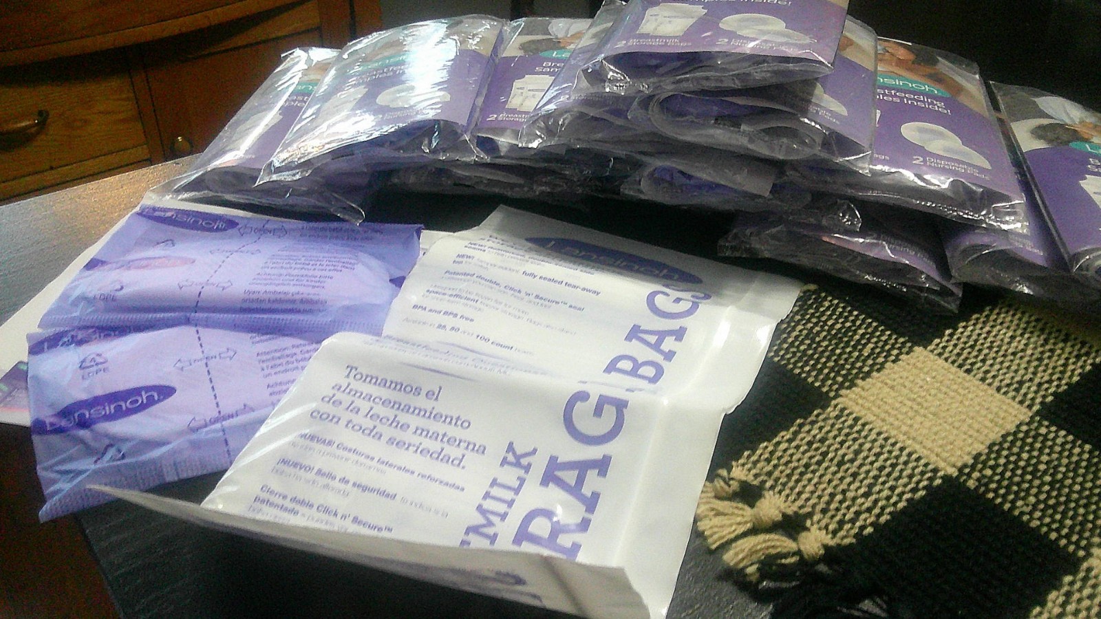 16 Packs of Lansinoh Nursing pads (2 each)and breast milk st