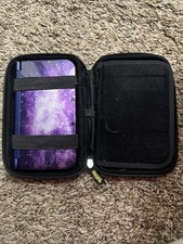 Nintendo 3DS XL Galaxy with Pokémon protecti...