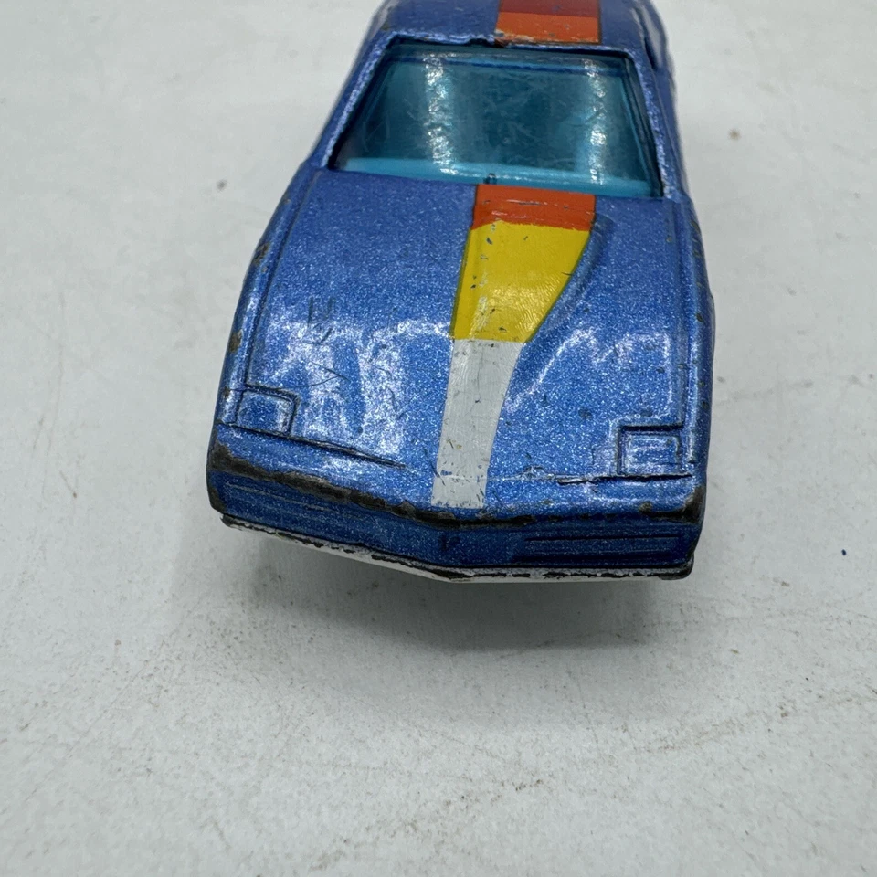 Matchbox Pontiac Firebird SE suelto 1:62 ruedas láser vintage 1982 azul Macao Foto 3 de 4