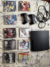 PS3 Slim With Controllers And Games