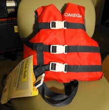 Omega childrens life jacket, new with tags. very safe, 30 to 50 lbs, cgap.