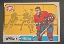 1968-69 O-Pee-Chee OPC #64 Mickey Redmond Rookie Hockey Card – Montreal Canadien. rookie card picture