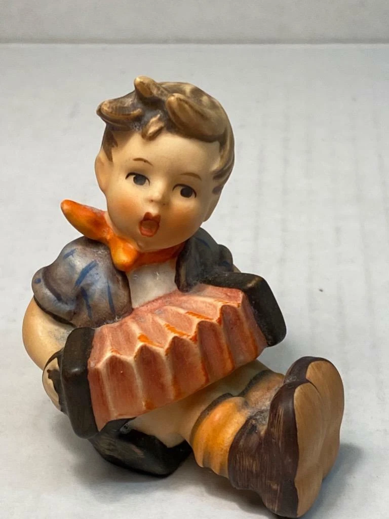 Hummel boy playing accordion deals