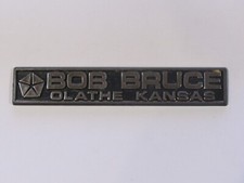 Vintage Bob Bruce Chrysler Olathe Kansas Plastic Dealer Badge Emblem Tag KS