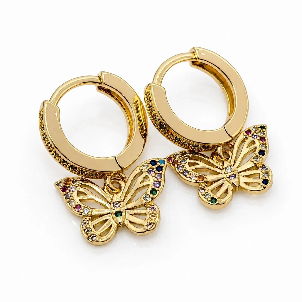 Boucles d’oreilles mini créoles dorées à l’or fin - Photo 1/3