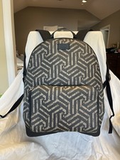 Gucci Zip Pocket Backpack GG Coated Canvas Me...