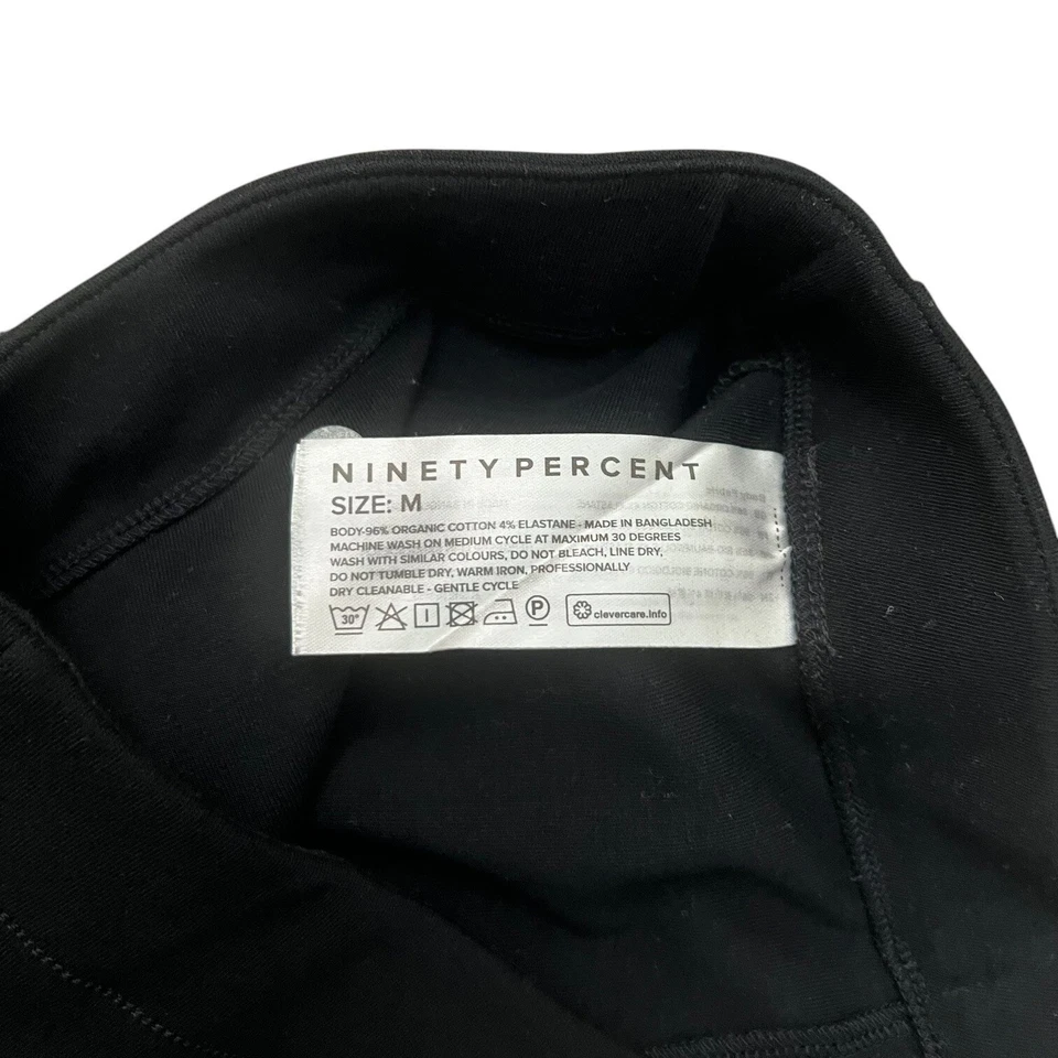 Pantalones de mujer Ninety Percent June Wilde acampanados negros medianos de algodón orgánico Foto 4 de 4