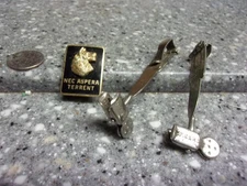 C15 vintage pinback wolf nec aspera terrent and wizard clip pair