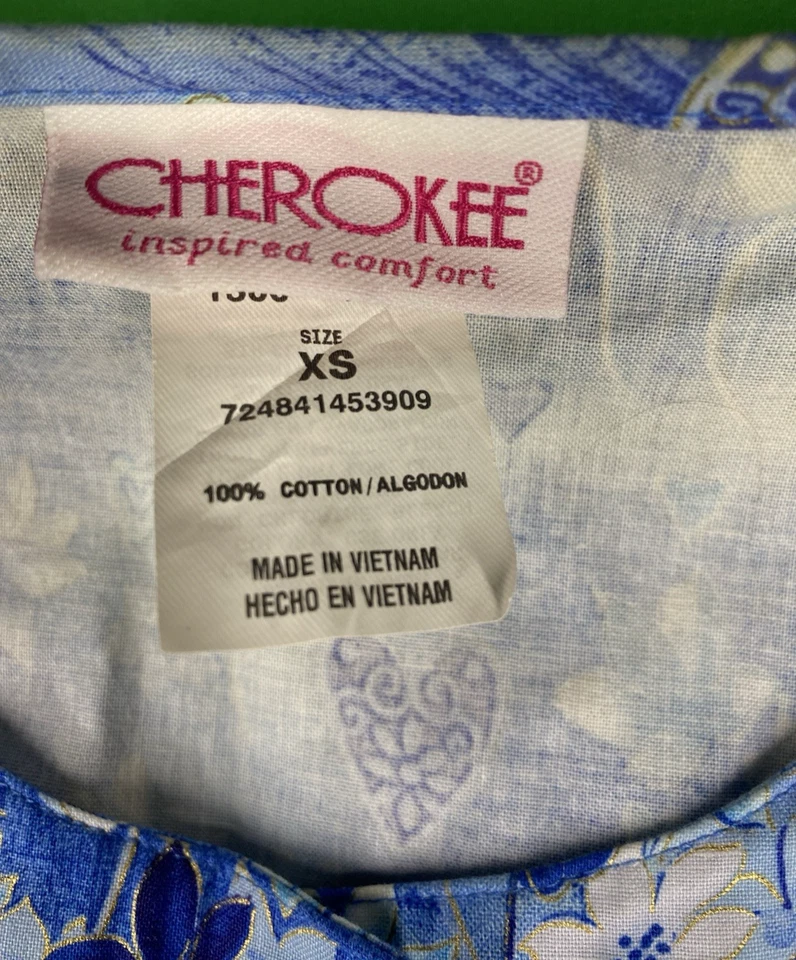 XS Blue and White Flower Patterned Cherokee Button Up Long Sleeve Scrub Top - Image 2 of 4