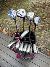 FULL LADIES STARTER SET OF GOLF CLUBS WITH A POWAKADDY CART BAG. FREE POST