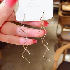 Aretes Violadores Para Fiesta Gala Aritos De Mujer Largos Onda Larga Elegantes