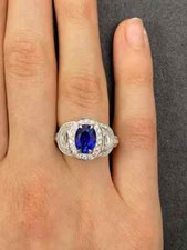 Features A Beautiful 2.40 Carat Oval Sapphire With a Cubic Zirconia Halo Ring