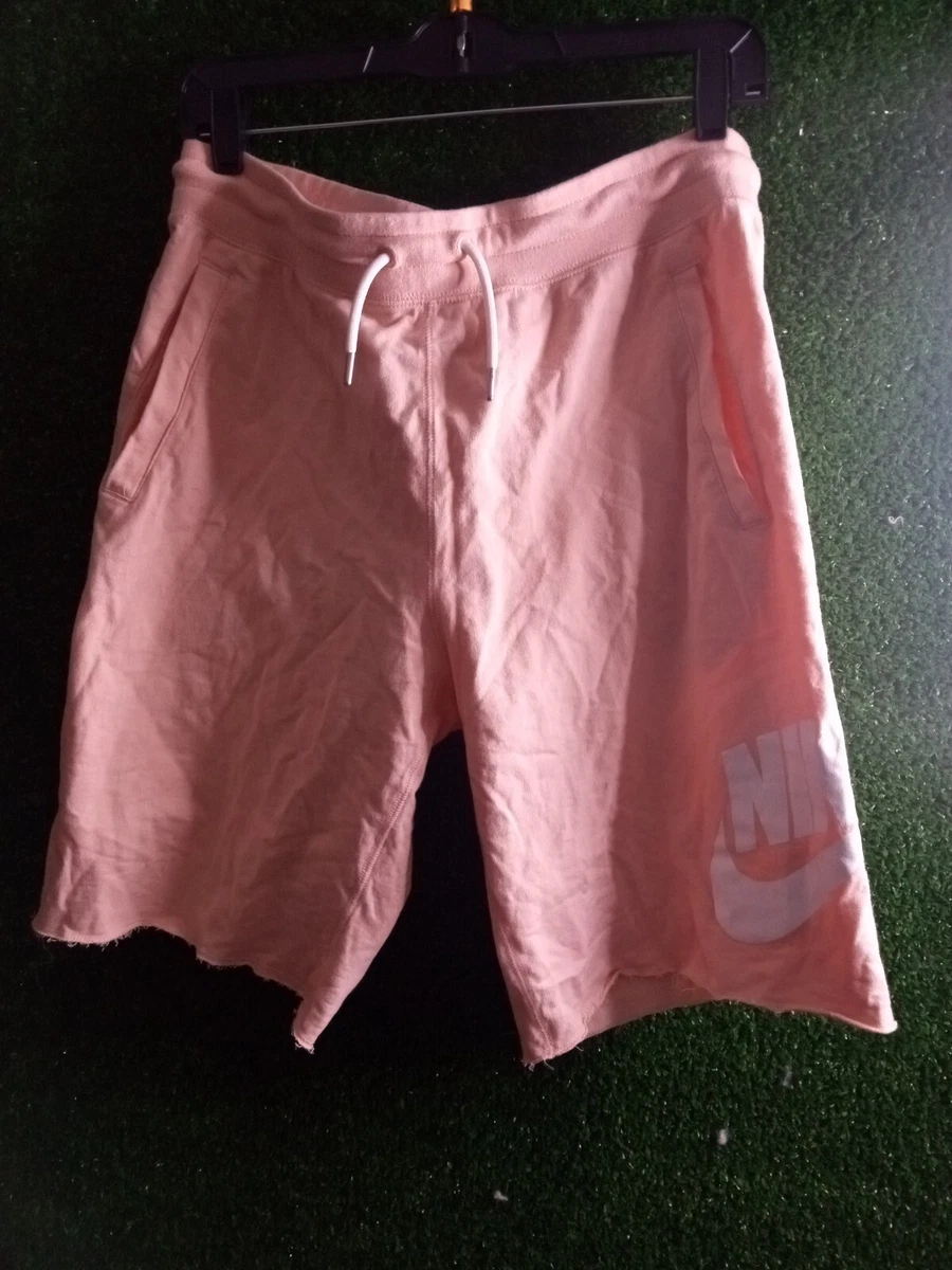 peach color nike shorts